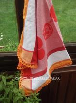 Torchon de cuisine orange avec une bordure au crochet